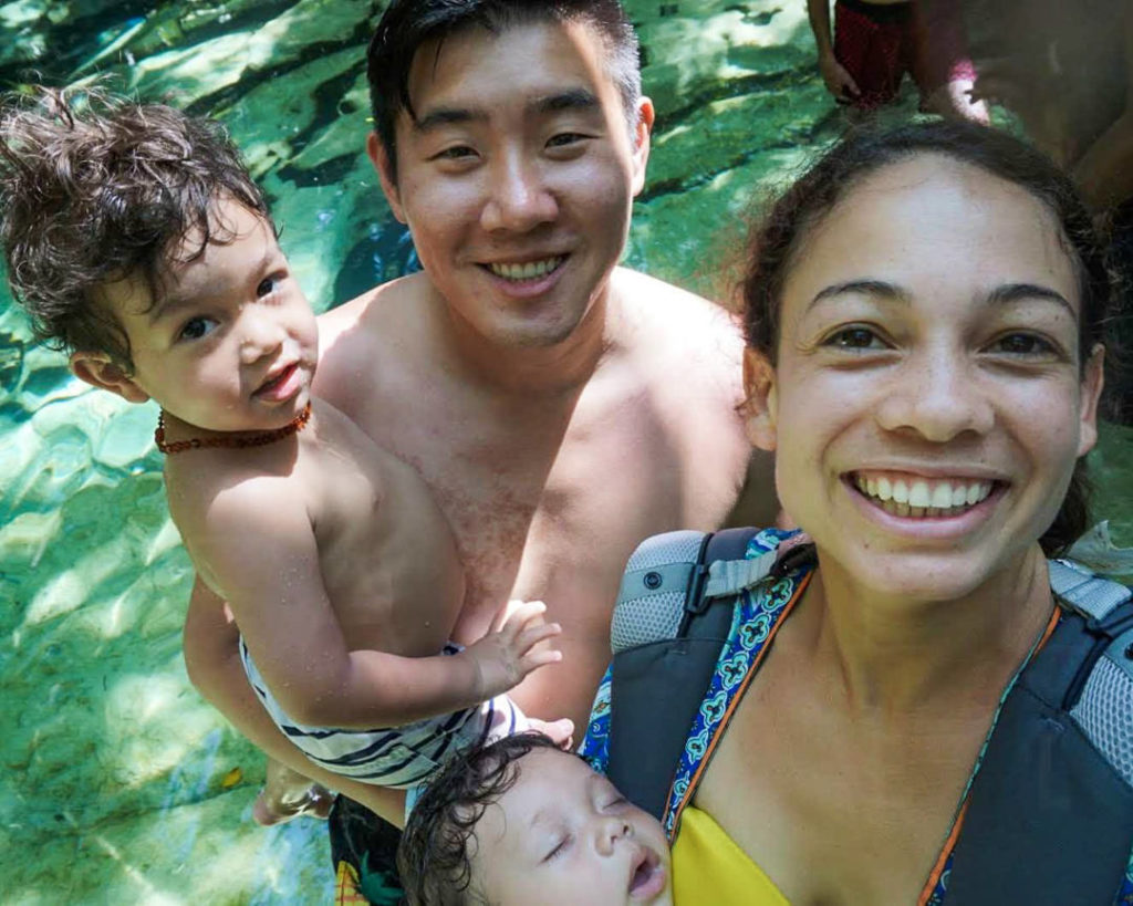 Mixed family selfie at Cenote Azul