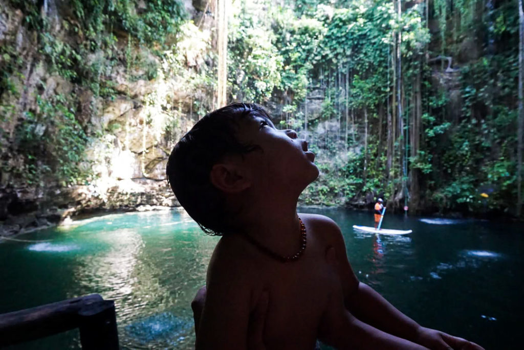 2 year old admiring Cenote Ik Kil