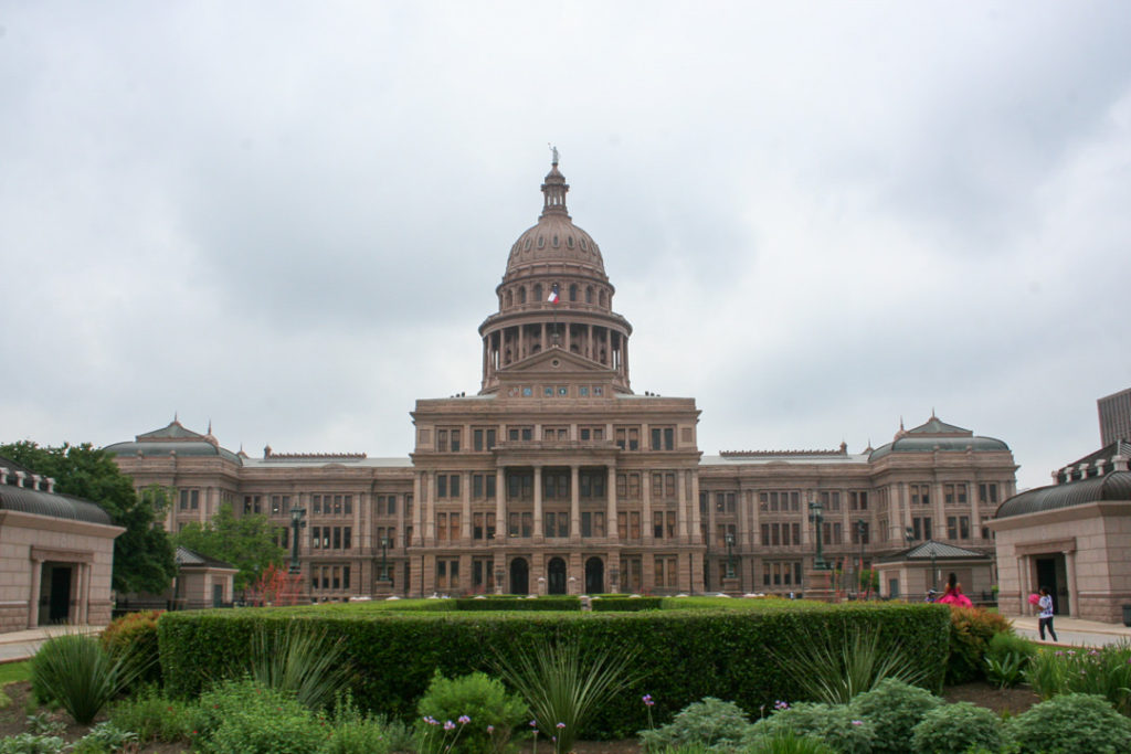 Texas State Capitol building on cloudy day