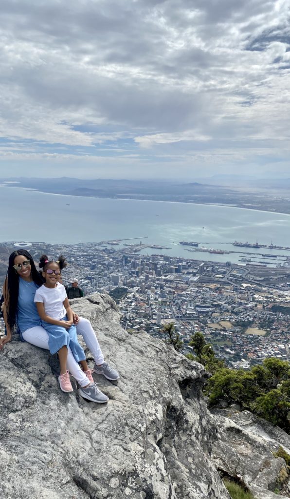 Black mom and daughter Cape Town lookout rock - diversity in family travel