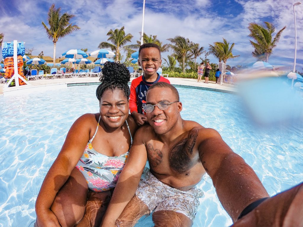 Young family at Coco Cay pool day