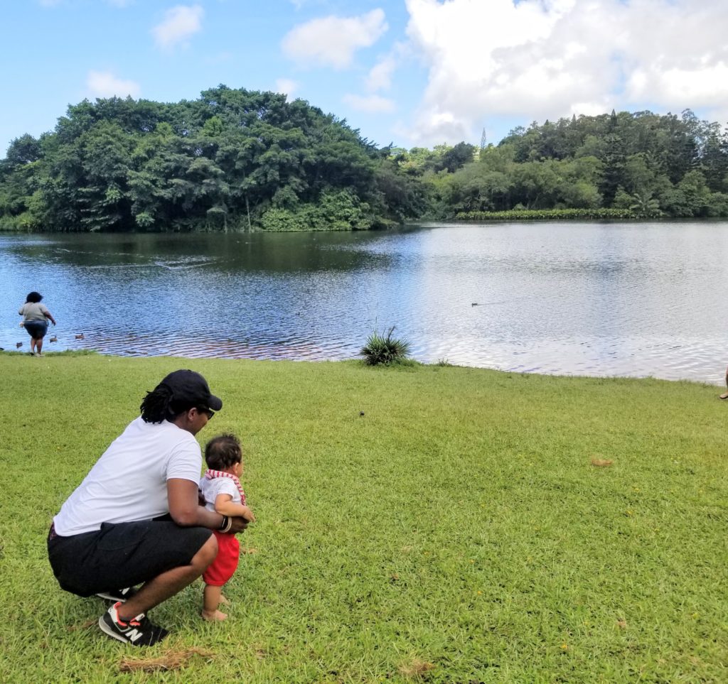 Mom and baby looking at lake