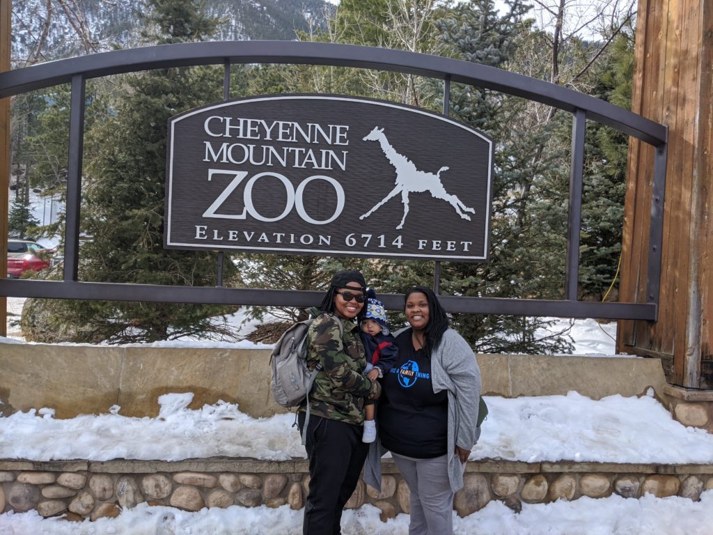 Black moms at zoo with son - diversity in family travel