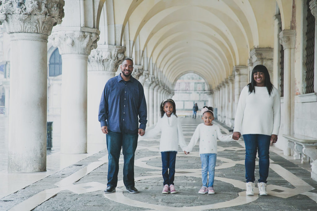 Black family with daughters traveling in Venice, Italy