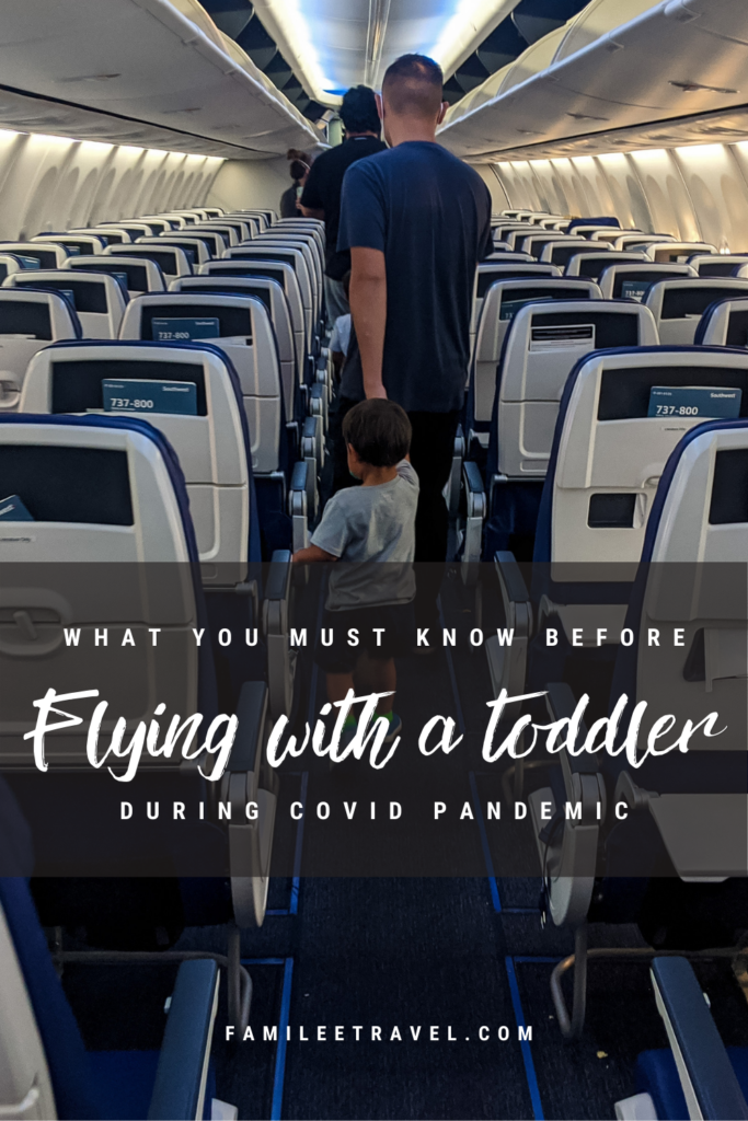 Dad walking toddler off plane - Pinterest pin image for what you must know before flying with a toddler in a pandemic