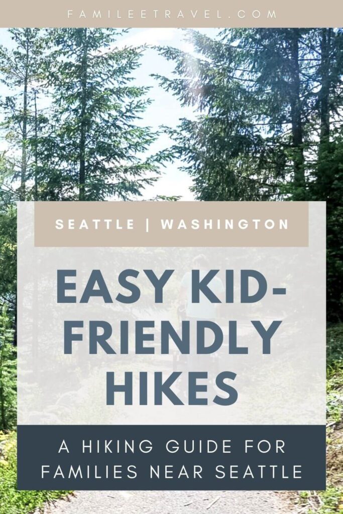 Tall evergreen trees line a forest trail in Seattle, Washington with text that reads "FAMILEETRAVEL.COM". The Pinterest-style graphic says "SEATTLE | WASHINGTON // EASY KID FRIENDLY HIKES // A HIKING GUIDE FOR FAMILIES NEAR SEATTLE" introducing a guide to kid friendly hikes near Seattle and easy hikes near Seattle for families.