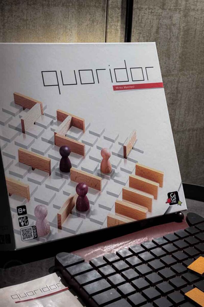 A close-up image of the board game Quoridor box on display, with wooden pegs, highlighting the hotel’s playful amenities for kids and families.