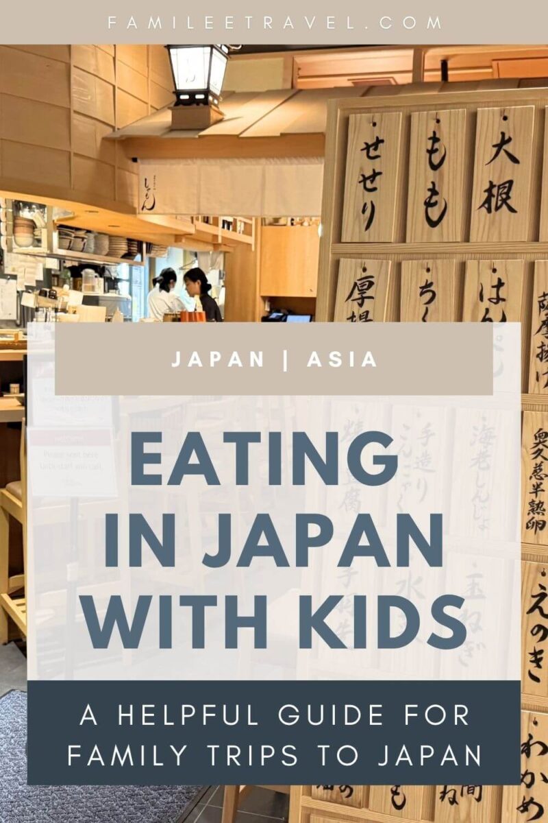 Cozy Japanese restaurant interior with wooden menu boards featuring Japanese characters and staff working behind the counter. Setup as a Pinterest graphic-style image with overlaid text reads “[FAMILEETRAVEL.COM](http://famileetravel.com/)”, “JAPAN | ASIA”, “EATING IN JAPAN WITH KIDS”, and “A HELPFUL GUIDE FOR FAMILY TRIPS TO JAPAN”, introducing a family travel guide about eating in Japan with kids.