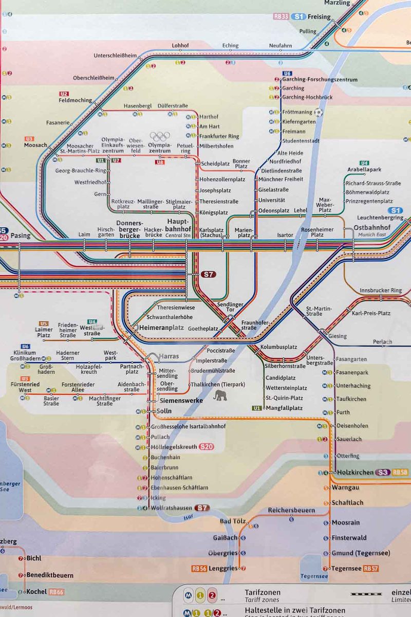 Munich public transportation map showing the colored U Bahn and S Bahn train routes running through the city and surrounding areas. Major interchange stations include "Marienplatz" "Hauptbahnhof" "Sendlinger Tor" and "Ostbahnhof" to help travelers plan journeys without a car.